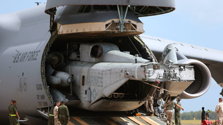 This Shot Of A C-5 Galaxy Regurgitating A CH-53E Super Stallion Is Crazy